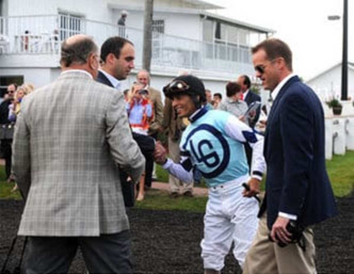 Bryan (right) and Kevin (left) with jockey John Velazquez at Tampa Bay Derby. Photo Joe DiOrio